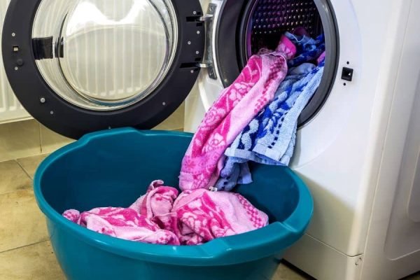colorful-clothes-and-towels-in-washing-machine-dru-2023-11-27-04-57-47-utc